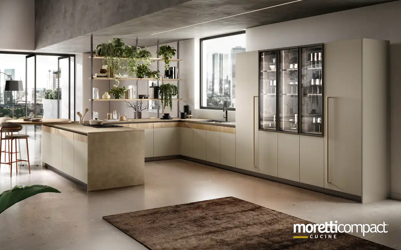 Cucina con penisola e libreria bifacciale