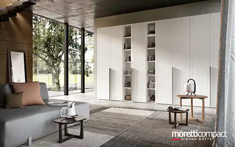 Armadio con ante battenti e due moduli libreria