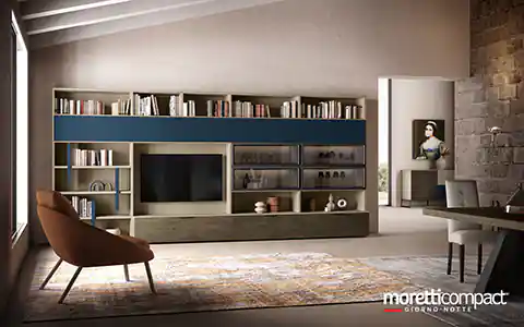 Libreria boiserie con dettagli blu