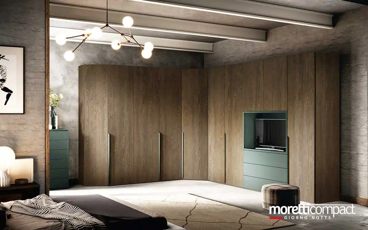 Armadio ad angolo con vano porta TV e cassettiera